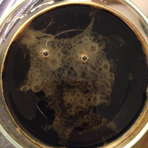 Omnipollo black beer in glass